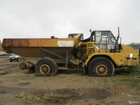 Сочлененный самосвал Caterpillar 730