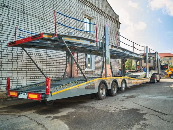 Полуприцеп автовоз на 9 автомобилей LUXUDA LZC9407BG 3 оси SAF (пневмоподвеска, ленивая передняя ось)
